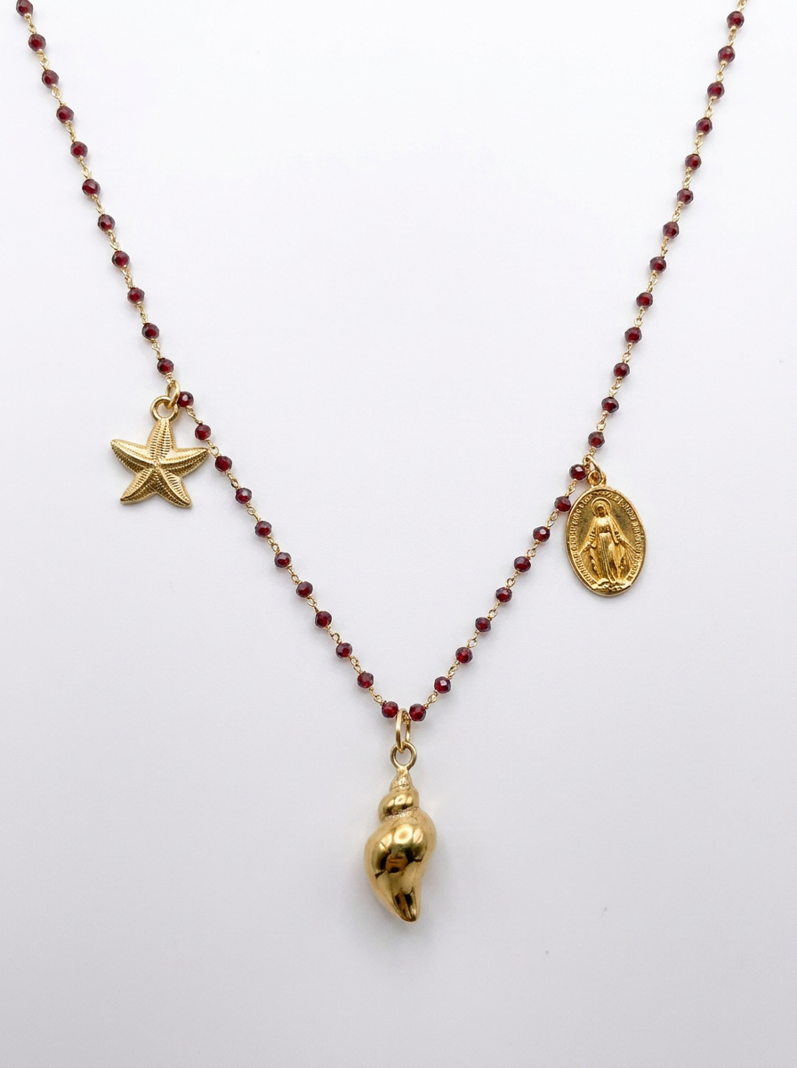 Collana conchiglia e madonnina e stella marina